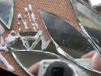 glue mirror bits onto board