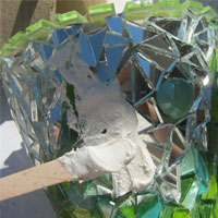 spread mosaic grout