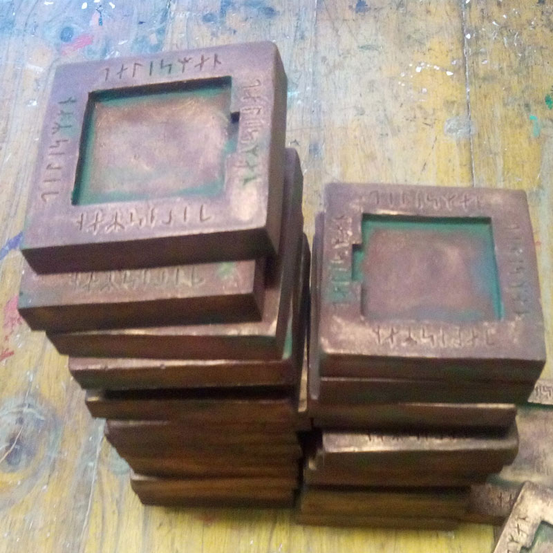 completed resin blocks made to look metalic
