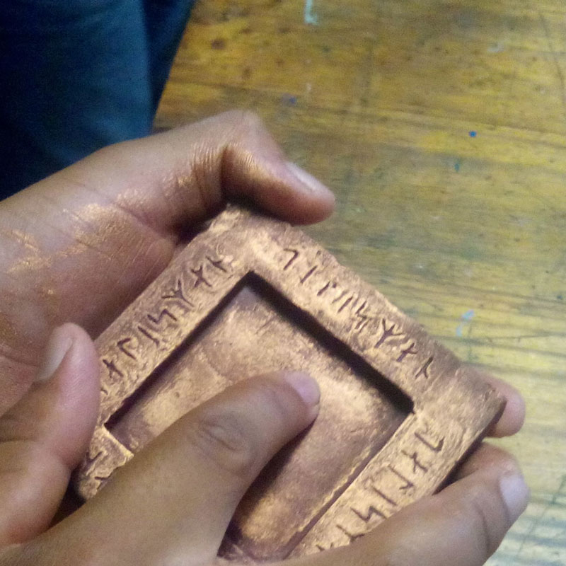 resing block covered in bronze gilding paste