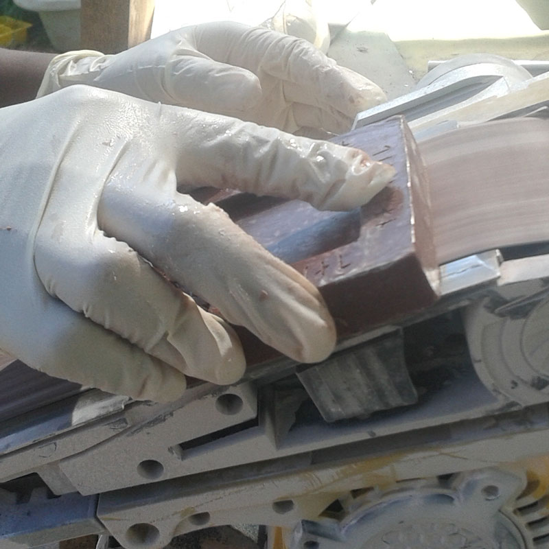 sanding the base of the resin block