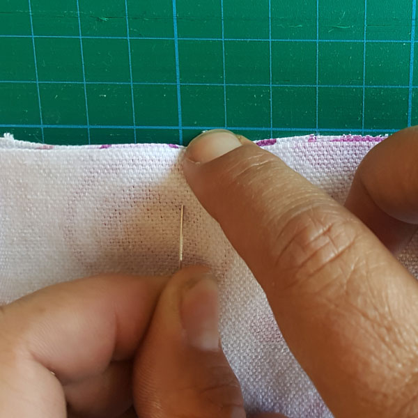 plaing pins to secure fabric in place