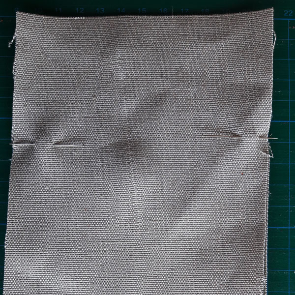 fabric secured in place with pins