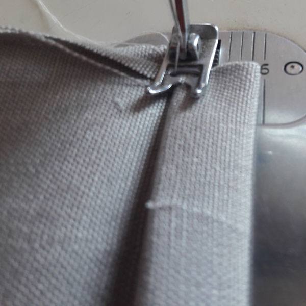 sewing top of drawsting bag