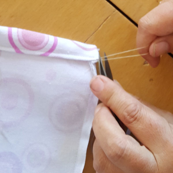 trimming off excess threads, neat and proud