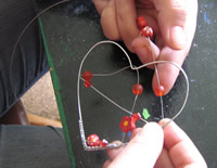 wrap wire and beads around heart