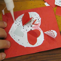 glue glitter onto valentines card