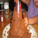 Build up the volcano with the sand