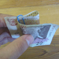paperclip on money