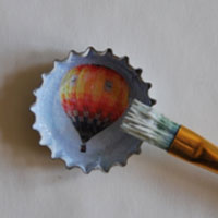 use paintbrush to paint glue