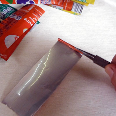 bending the end of the soda can strip