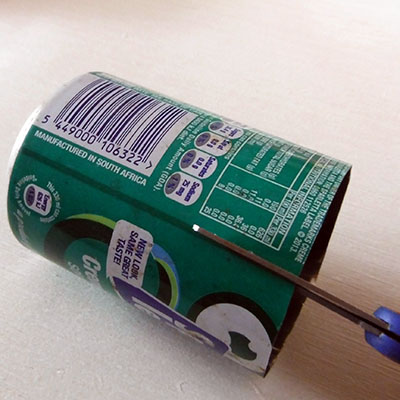 cutting though side of can