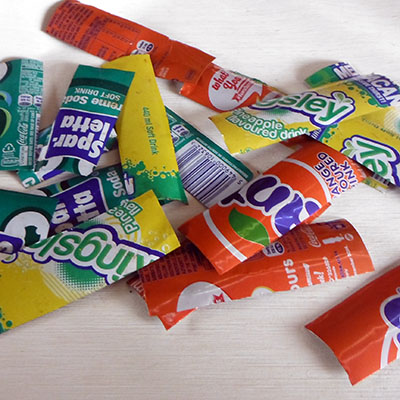 pile of cut soda can strips