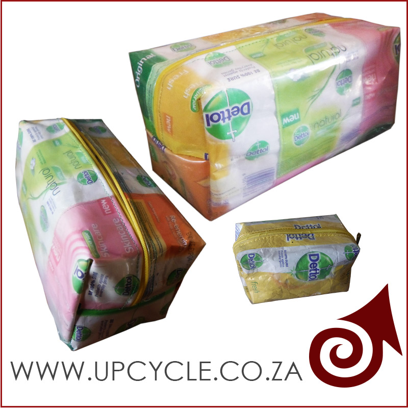 Upcycled utility bags made from soap wrappers covered covered with plastic