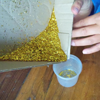 tip glitter into container