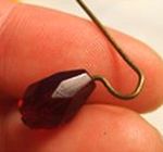 threading bead onto pinhead