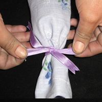 tie a bow on the top of bag