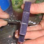 drilling hole in candle slice