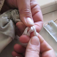 knot the rope and elastic