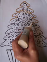 trace christmas tree onto acetate with liquid lead