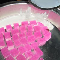 pore melted wax into mosaic