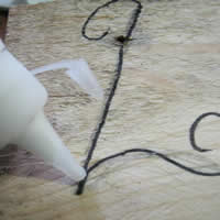 apply glue to mosaic wood