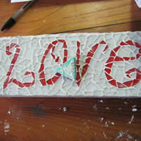 grouted mosaic timber love block