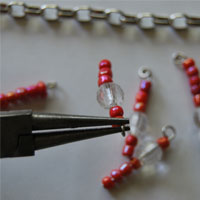 twist head pin using pliers to create loop