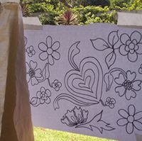 stick design on window using masking tape