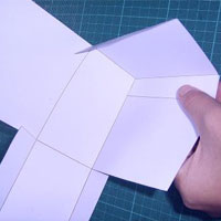 stick paper house together using double sided tape