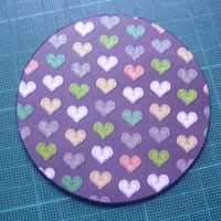 sticking pretty paper onto the chipboard base