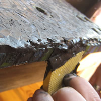 grout edges of mosaic