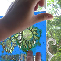 stick stencil on window