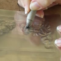 smooth off embossing on pewter