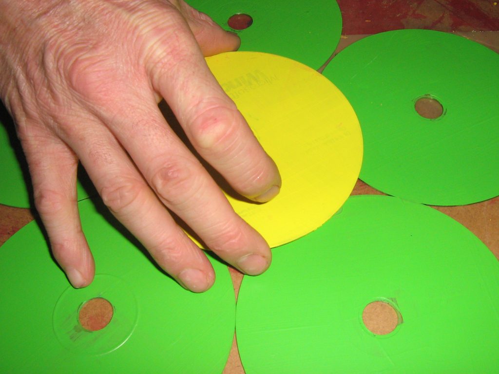 glue the cds together to create a flower