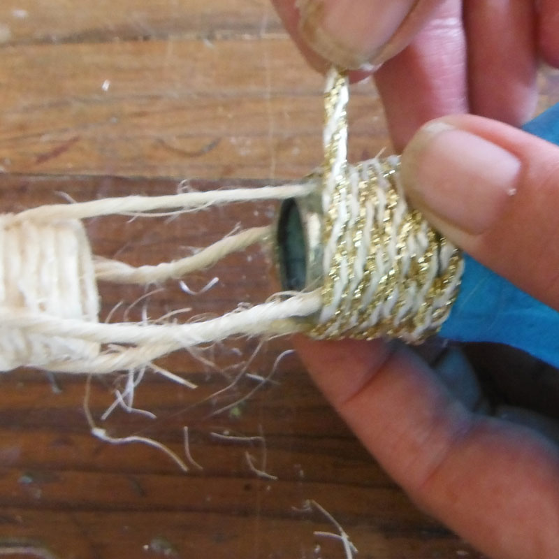 adding a colourful string to the bottom of the hotair balloon