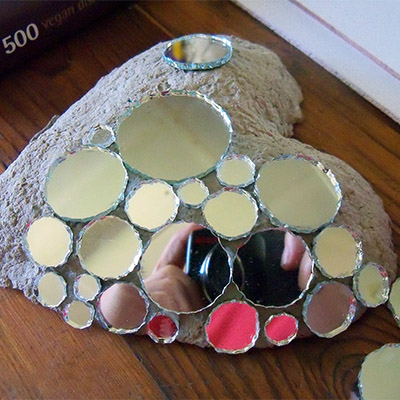 stick different size mirrors