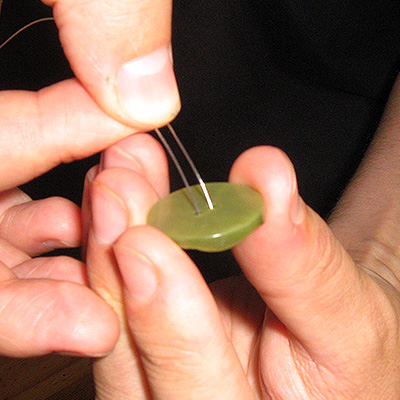 thread wire into stopper