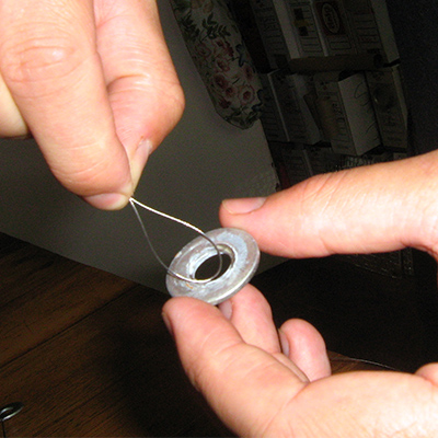 thread wire into washer