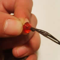 tie a bead on